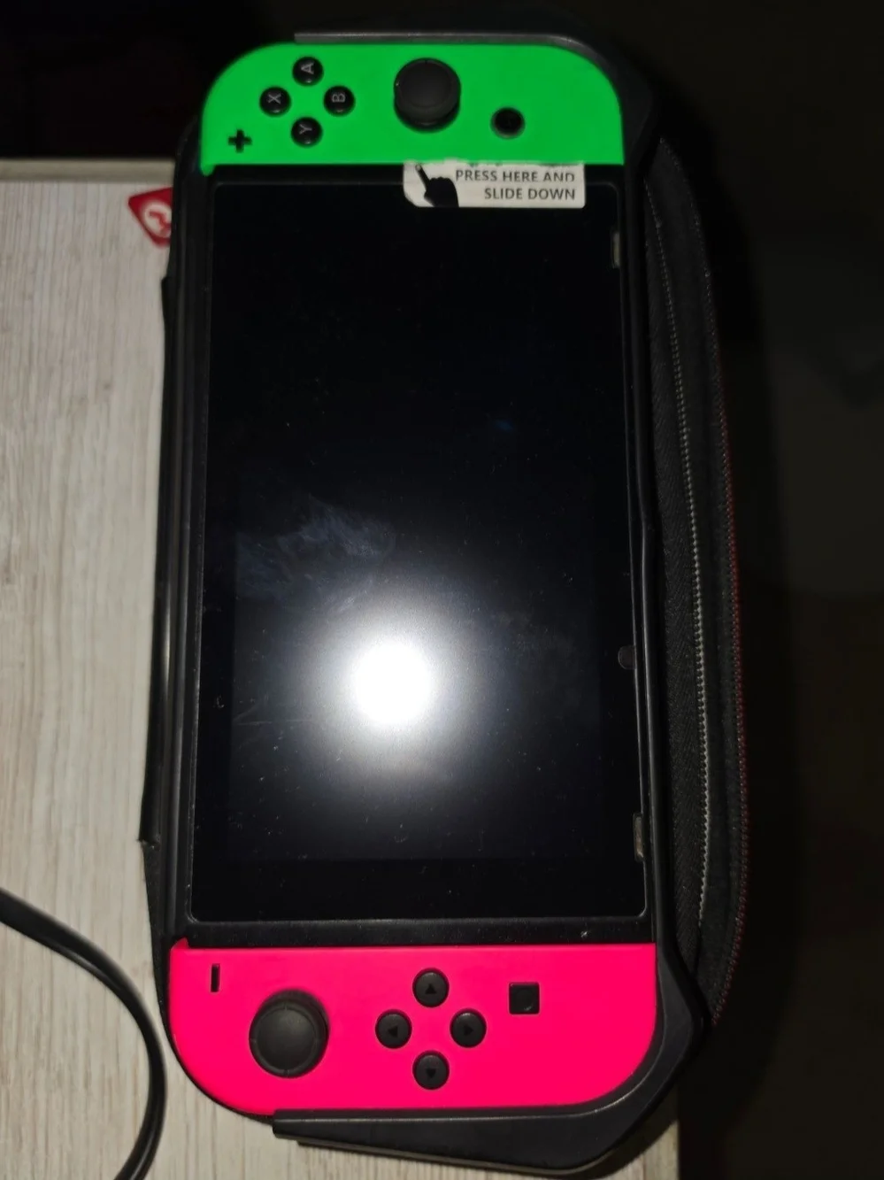 Nintendo Handheld Console with Neon Green & Neon Pink Joy-Con